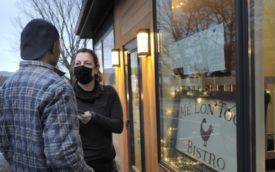 The angel appeared on the cold Camden sidewalk.